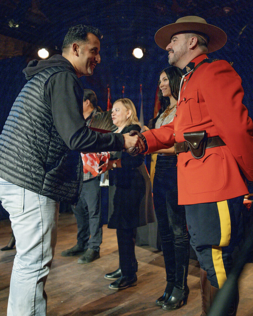 New citizen celebrating at Montreal citizenship ceremony.