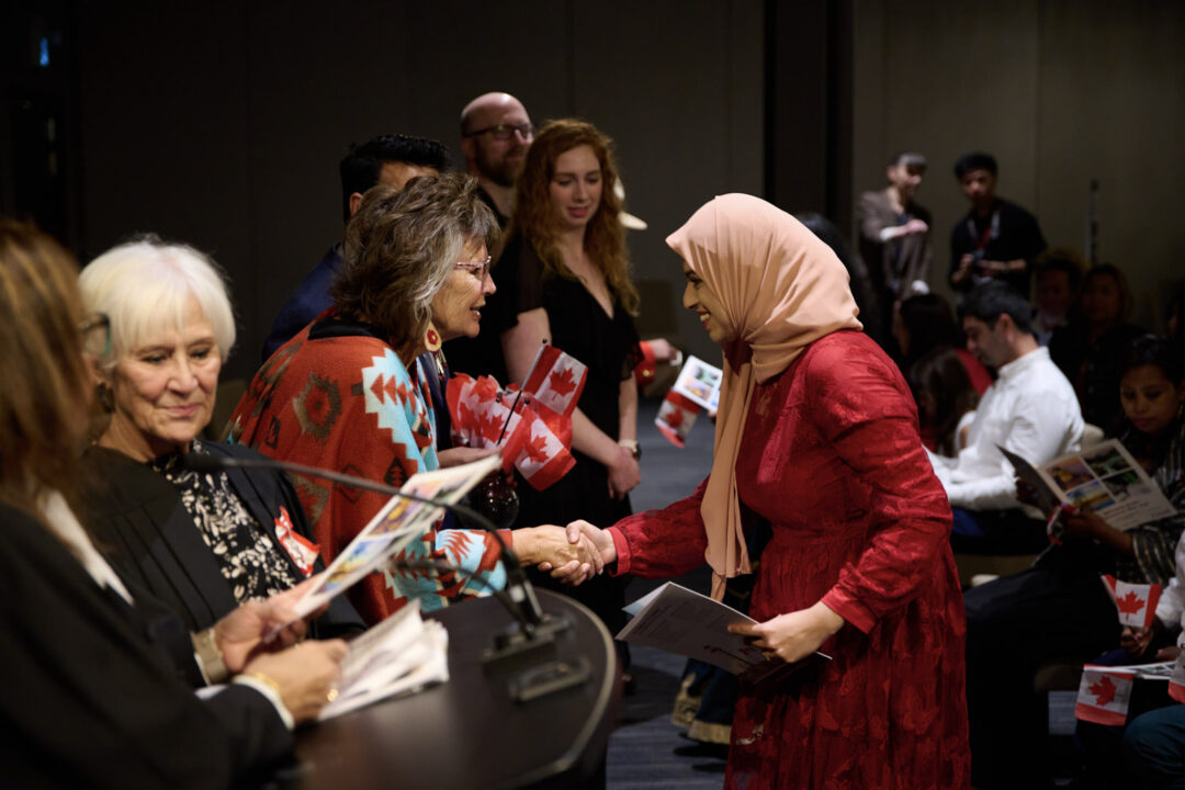 Person receiving their Canadian citizenship in Calgary.