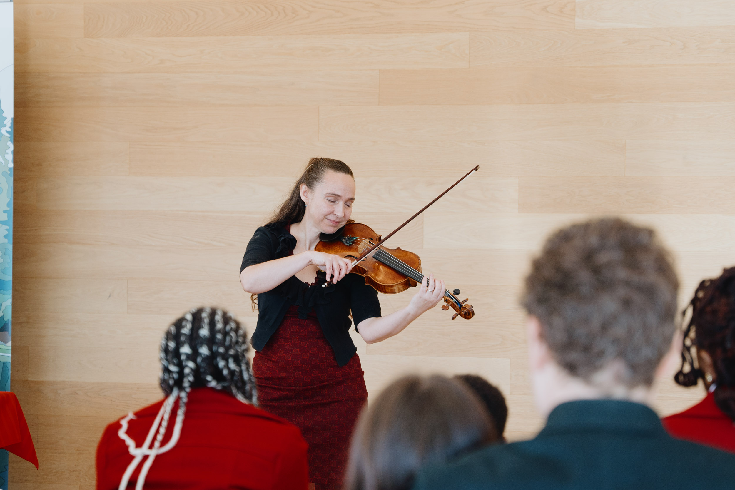 Musician opening the ceremony playing the violin