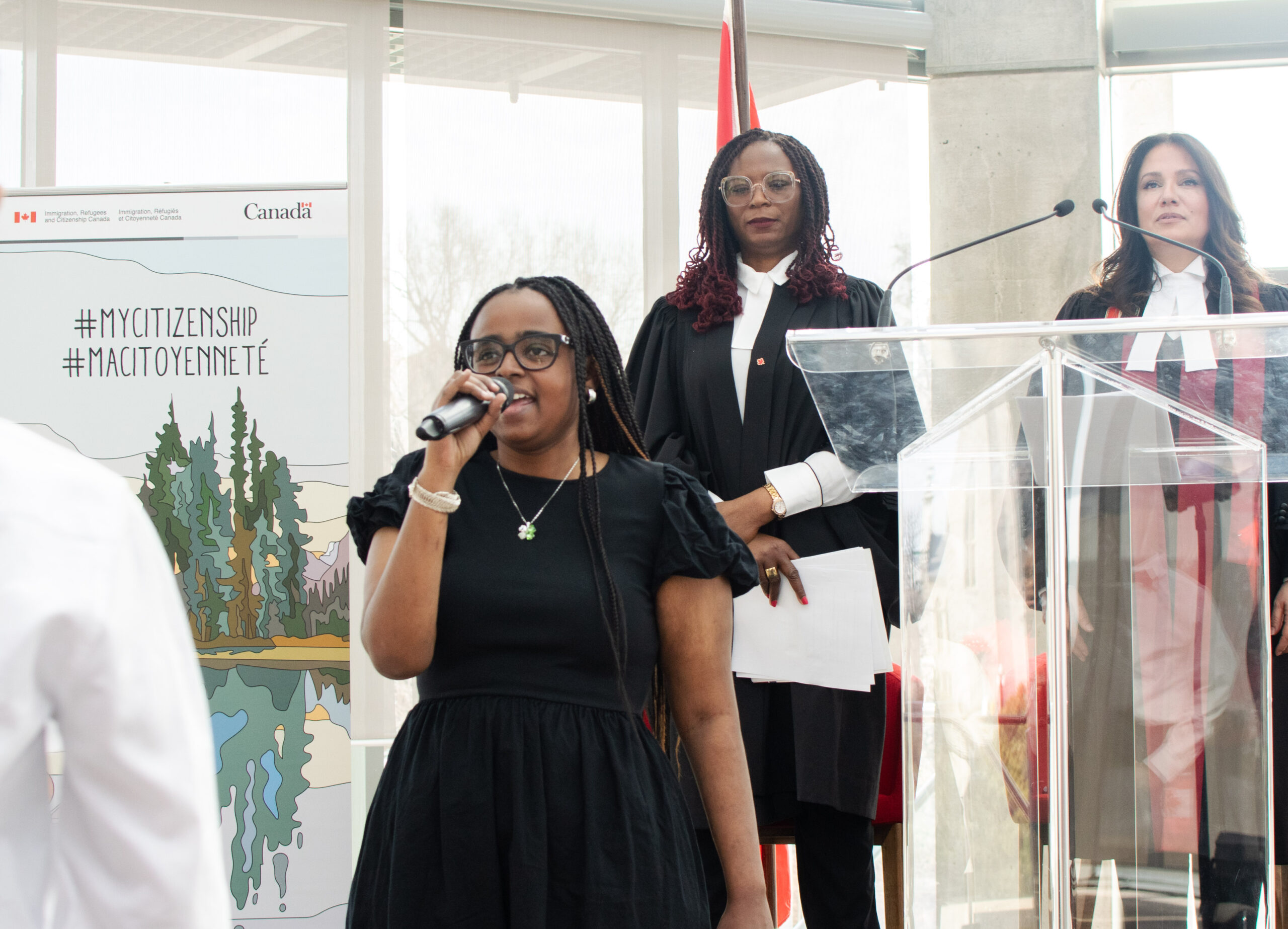 Samar El Faki delivering the National Anthem